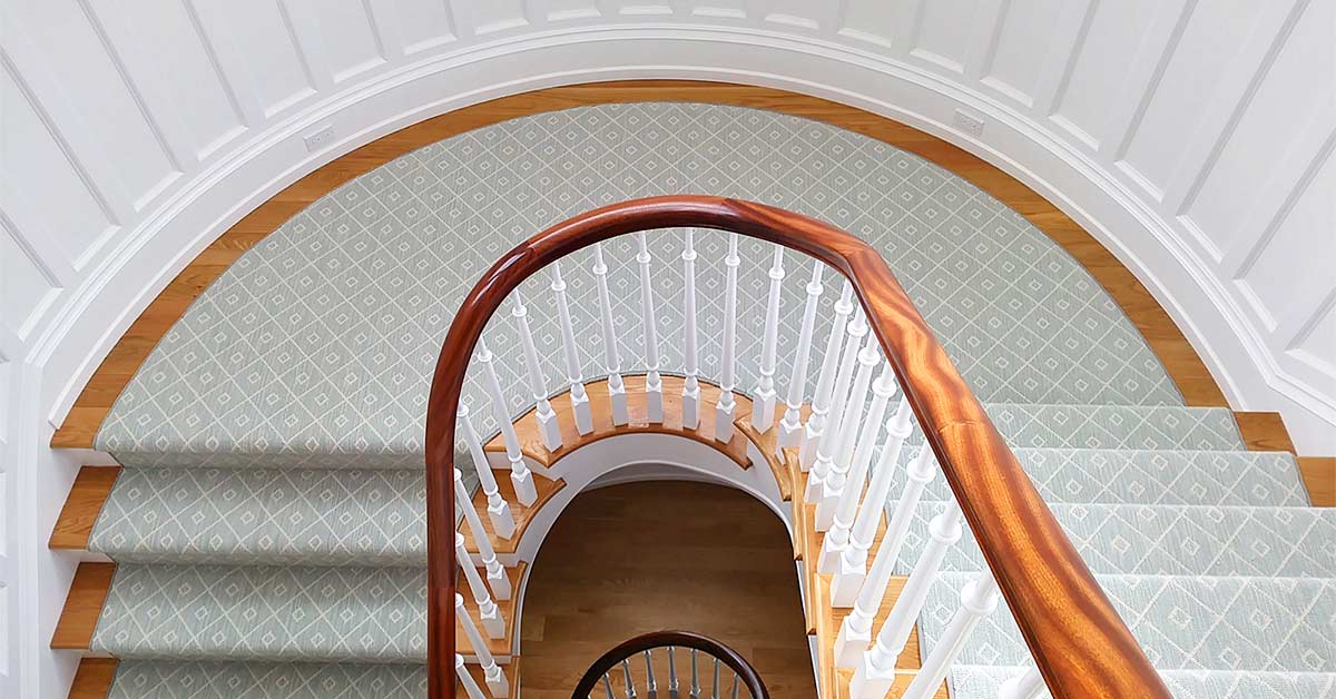 https://www.islandcarpettilehardwoodnewport.com/root/clientImages/G5576/teal-stair-carpet-subtle-pattern.jpg