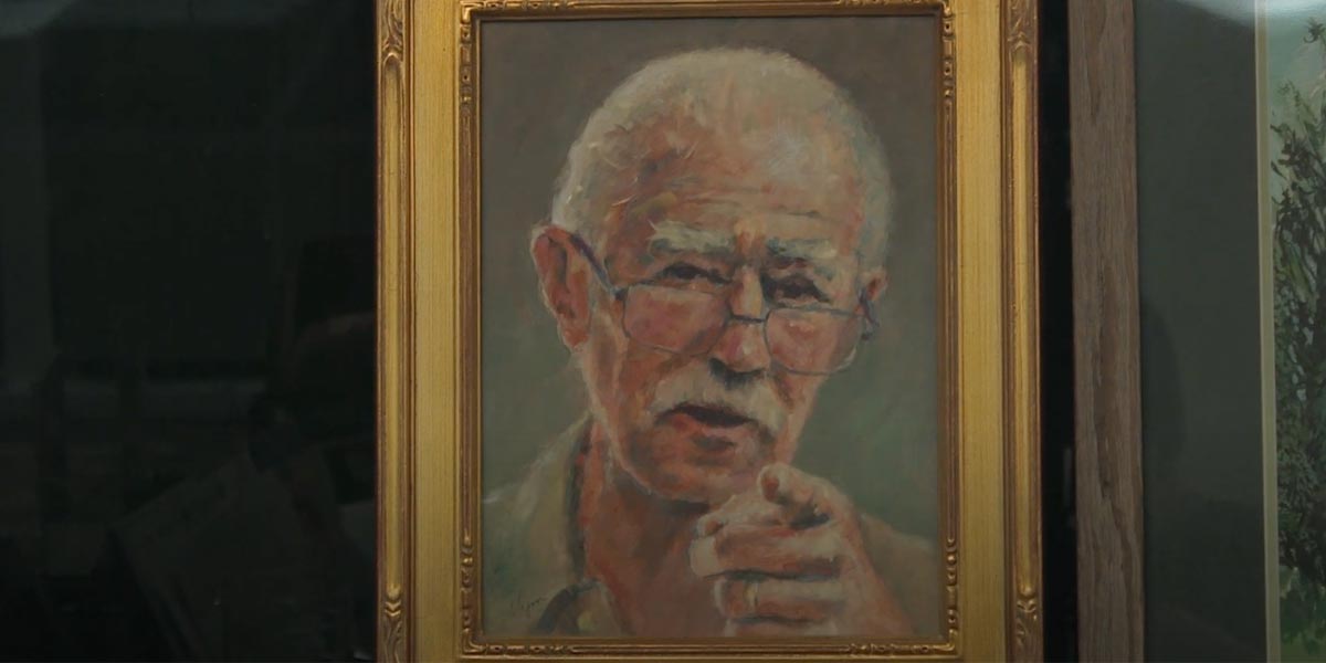 Portrait of Ken Fain's father with gold frame
